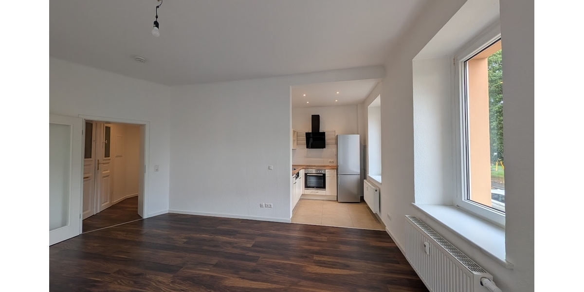 Wohnzimmer mit Küche